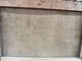 a picture of an old wooden window with a sign on it