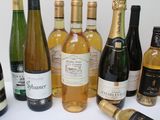 many bottles of wine that are on the table