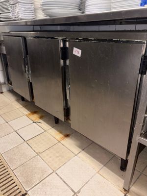 many plates stacked on top of each other in the kitchen