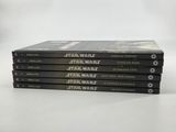 a stack of star wars books sitting on top of each other
