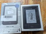 packaging of a kindle book sitting on a table next to a box