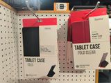 two boxes of tablet cases on the shelf in the store