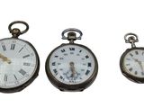 three different types of clocks are shown on a white background