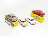 three toy cars that are sitting on top of each other