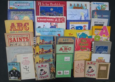 many children ' s books on display on a table