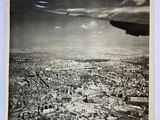 an old black and white photo of an aerial view of a city