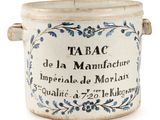 an image of a ceramic jar with writing on it