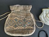 an image of a purse and a purse chain on a table