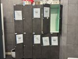a photo of a bathroom with a bunch of lockers