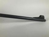 a close up of a black pipe on a white surface