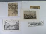 several drawings of buildings and buildings are displayed on a table