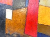 abstract painting of multicolored squares and rectangles on a black background