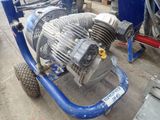an image of a small air compressor on a cart
