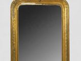 an image of a gold framed mirror on a white background