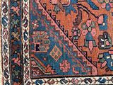 a close up of a rug on a white surface