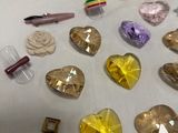 a lot of different colored stones on a white table