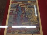 a picture of a painting on display in a glass case