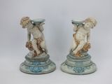 two statues of cherenshes on top of each other
