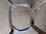 a piece of metal that has been cut in half