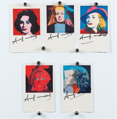 four pictures of a woman with different colored hair are hanging on a wall