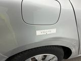 a close up of a car with a sticker on it