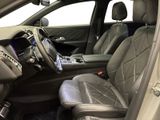 the interior of a car with leather seats and a steering wheel