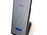 an image of a cell phone is sitting on top of a stand