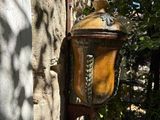 a light that is attached to the side of a building