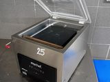 a machine that is sitting on a table in a kitchen
