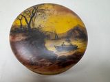 a picture of a painting on a ball on the wall