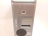 a silver computer tower sitting on a white surface