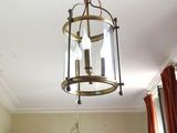 a light that is hanging from the ceiling in the room