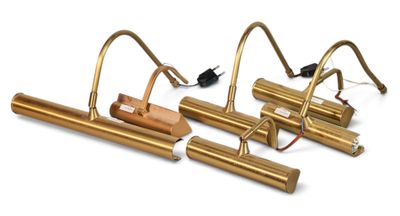 three brass tubes with wires and wires attached to them