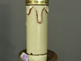 a candle that is sitting on top of a table