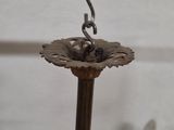 a bird that is sitting on top of a bird feeder