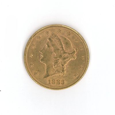 une image d'une pièce d'or sur une surface blanche