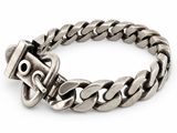 a close up of a metal bracelet with a clasp on it