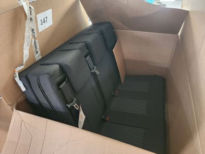 two suitcases in a box that are sitting in the box
