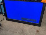 an image of a flat screen tv sitting on top of a floor
