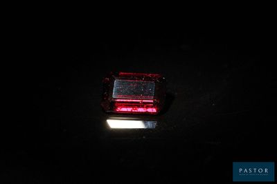 an image of a red light in the dark