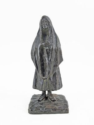 statue of a woman holding a baby in her arms