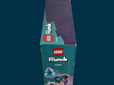 a box of lego friends figures sitting on a table