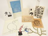 several cards and envelopes of various designs on a white surface