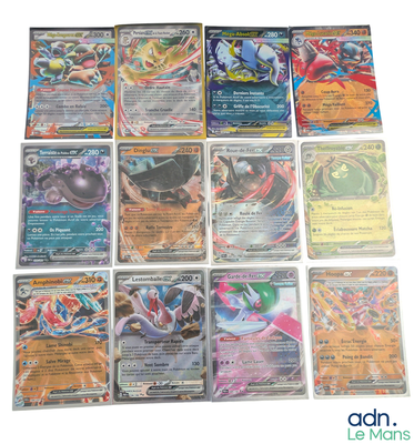 beaucoup de cartes pokemon sur la table