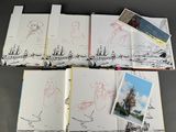 an open book with drawings and pictures of people on it