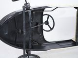 a small toy car with a steering and a steering wheel