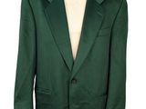 a close up of a green suit on a mannequin dummy