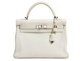 a white leather handbag on a white background