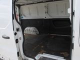 a white van with the door open and a bag in the back of it