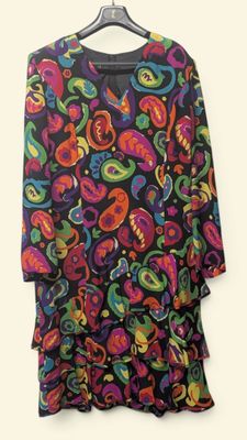 a black dress with multicolored paisley print on it